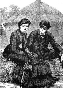 Un jeune couple assis ensemble