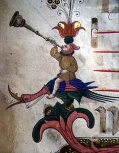 Missel 515 f.9r Figure soufflant dans une corne, montée sur un oiseau harnaché, détail de la bordure décorative d