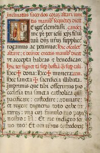 Initial T : Un prêtre célébrant la messe