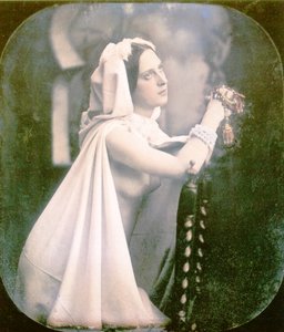 Une femme agenouillée sur une chaise en prière, 1850