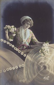 Jeune femme tenant beaucoup de fleurs et travaillant dans une usine - French Photographer