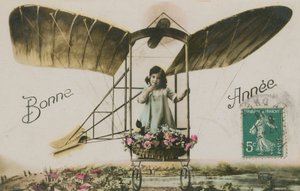 Carte de vœux de Nouvel An avec une fille dans un avion - French Photographer