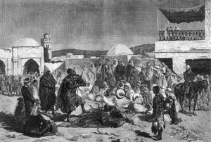 Un charmeur de serpents sur la place du Souk de Béja en Tunisie - French School