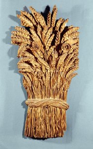 Enseigne de boulanger avec des épis de blé et des fleurs des champs