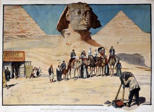 Caravane de touristes photographiée devant le sphinx de Gizeh