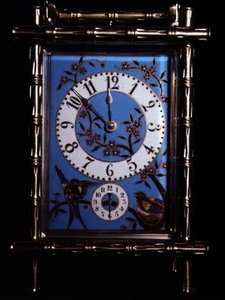 Pendule de voyage chinoiserie avec cadran et panneaux latéraux émaillés