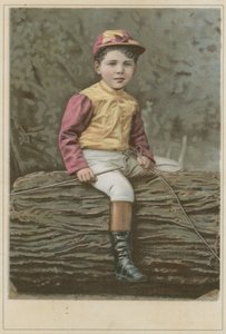 Petit garçon en tenue de jockey assis sur une bûche - French School