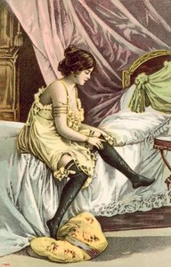 Fille à demi-nue, assise sur un lit, ajustant ses bas