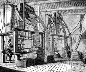 Ouvriers de la soie dans un atelier à Lyon utilisant un métier Jacquard, vers 1880