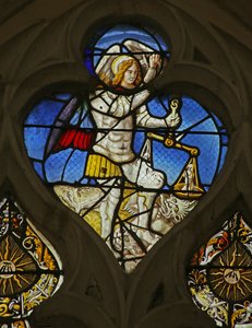Saint Michel pesant les âmes et piétinant un diable