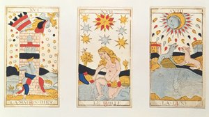 Trois cartes de tarot représentant la Tour, l