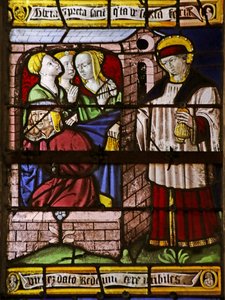Vitrail représentant Saint Nicolas laissant de l