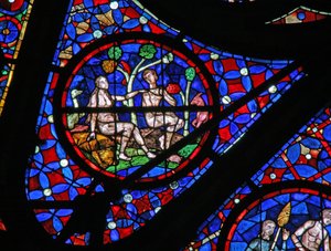 Fenêtre w115 représentant Adam et Ève sous un arbre avec des animaux et des oiseaux