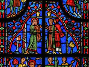 Fenêtre w11 représentant Saint André donnant ses vêtements