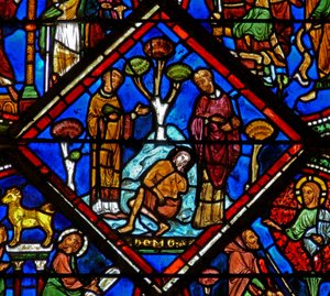 Scène dans la fenêtre du Bon Samaritain : le pèlerin est ignoré par un prêtre et un Lévite