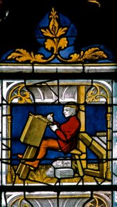 Fenêtre w25 représentant un drapier au travail dans la fenêtre des Drapiers - French School