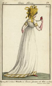 Femme habillée pour les jardins de plaisir du Jardin d