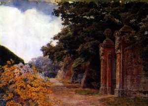 Une bordure de jardin avec un mur et une porte