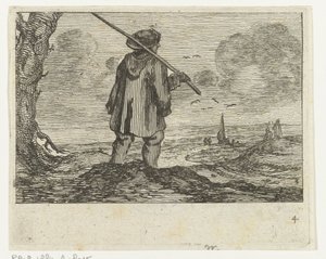 Paysage de dunes avec un homme, avec un bâton sur l