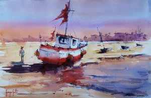 Un bateau échoué au coucher du soleil