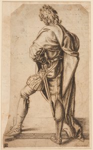 Un homme debout, vu de dos