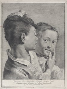 Garçon avec un chapeau touchant le visage d