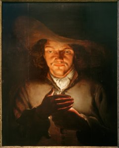 Un homme avec une bougie