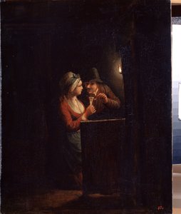 Un homme et une femme à la lueur d