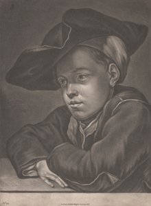 Garçon assis à une table