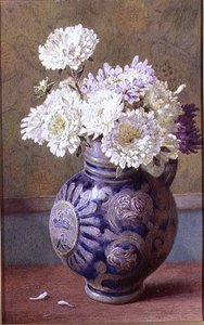 Chrysanthèmes dans un pichet en grès