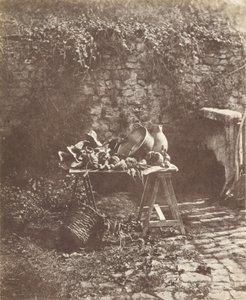 Nature morte - Chaudron, cruche et légumes sur une table à tréteaux