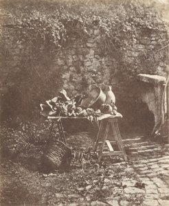 [Nature morte: Chaudron, cruche et légumes sur une table à tréteaux]