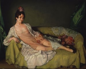 Femme allongée sur un fauteuil en combinaison et robe de chambre – XXe siècle