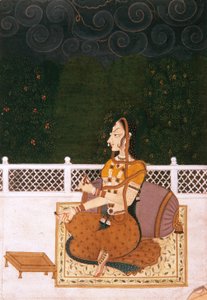 Une belle femme assise contre un traversin - Indian School