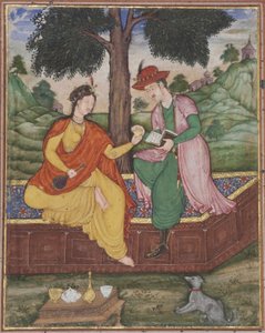 Un homme et une femme assis sous un arbre