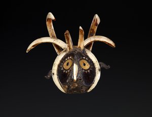 Masque buccal probablement représentant la tête d