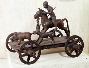 Âge du fer : miniature en bronze représentant une scène de chasse au sanglier
