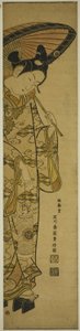 Jeune homme portant une lanterne et un parapluie