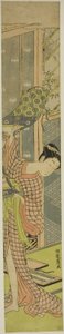 Jeune femme accrochant un tableau - Isoda Koryusai