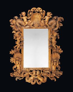 Grand miroir en pin sculpté d