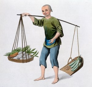 Un garçon avec des légumes