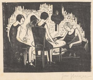 Quatre femmes assises à une table