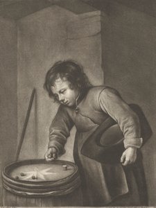 Garçon jouant aux billes