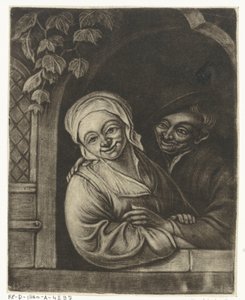 Couple dans une ouverture de fenêtre