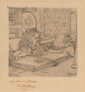 Charley regardant un album de gravures