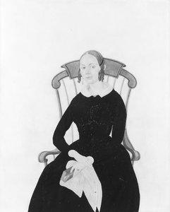 Dame assise dans un fauteuil à bascule de Boston