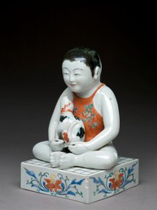 Garçon avec un chien assis sur une table shogi carrée, Kakiemon, Japon, 1680-1700 (faïence avec sous-glaçure bleue)