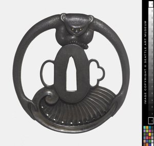Tsuba : Singe tenant une coquille