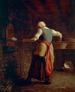 Femme cuisant le pain