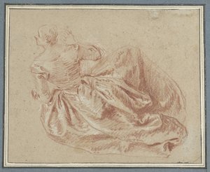 Dame assise par terre